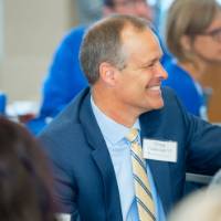 Guests listening to President Haas speak.